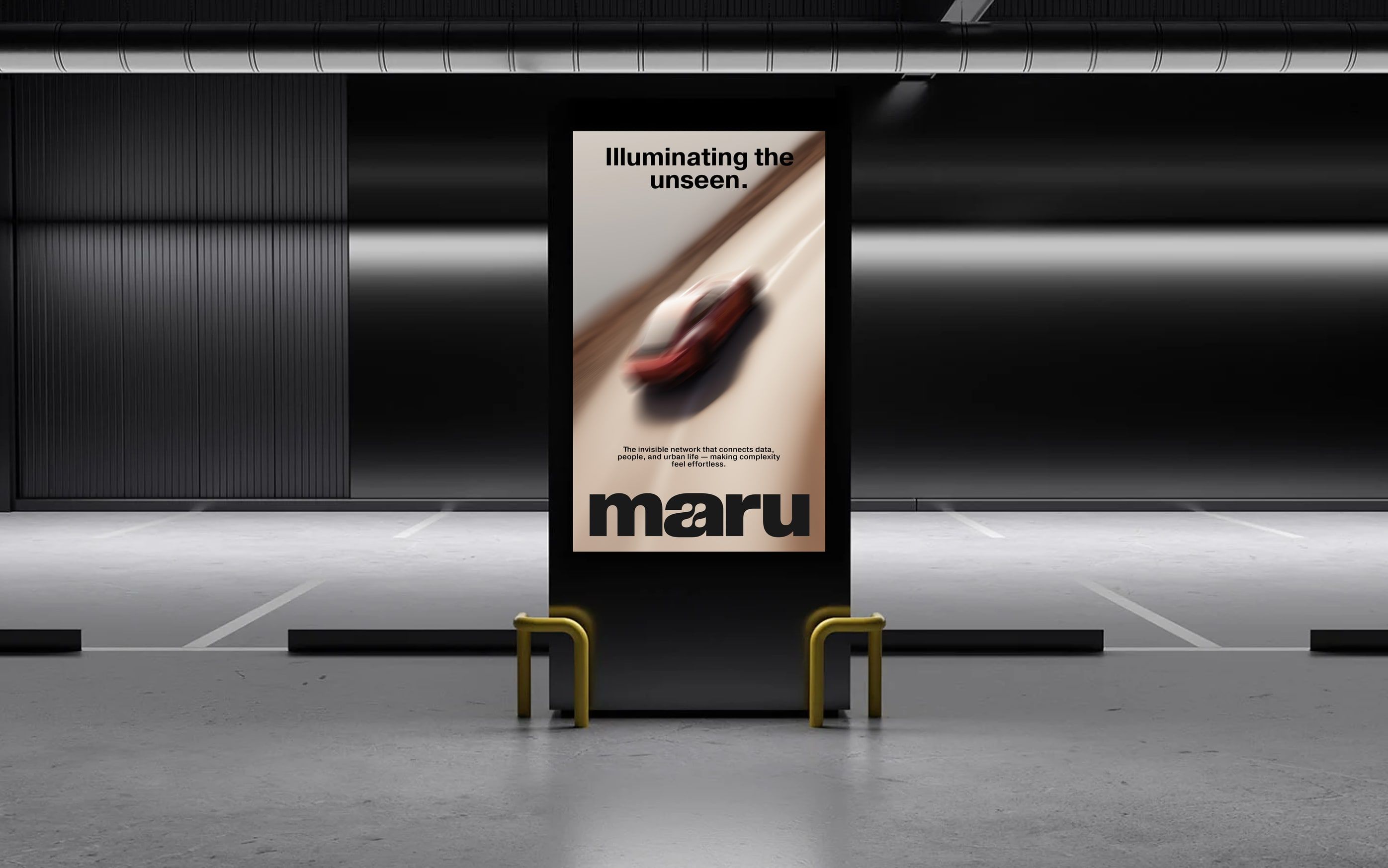 maru poster reading "illuminating the unseen" in an underground car park
