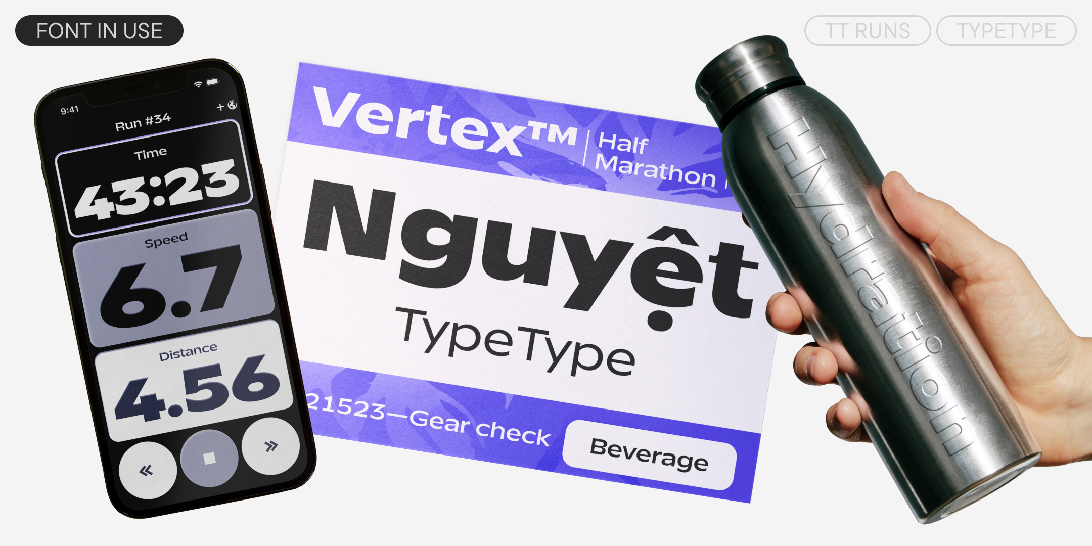 tt runs on a running tracker, a violet marathon race bib and a metallic drinks bottle