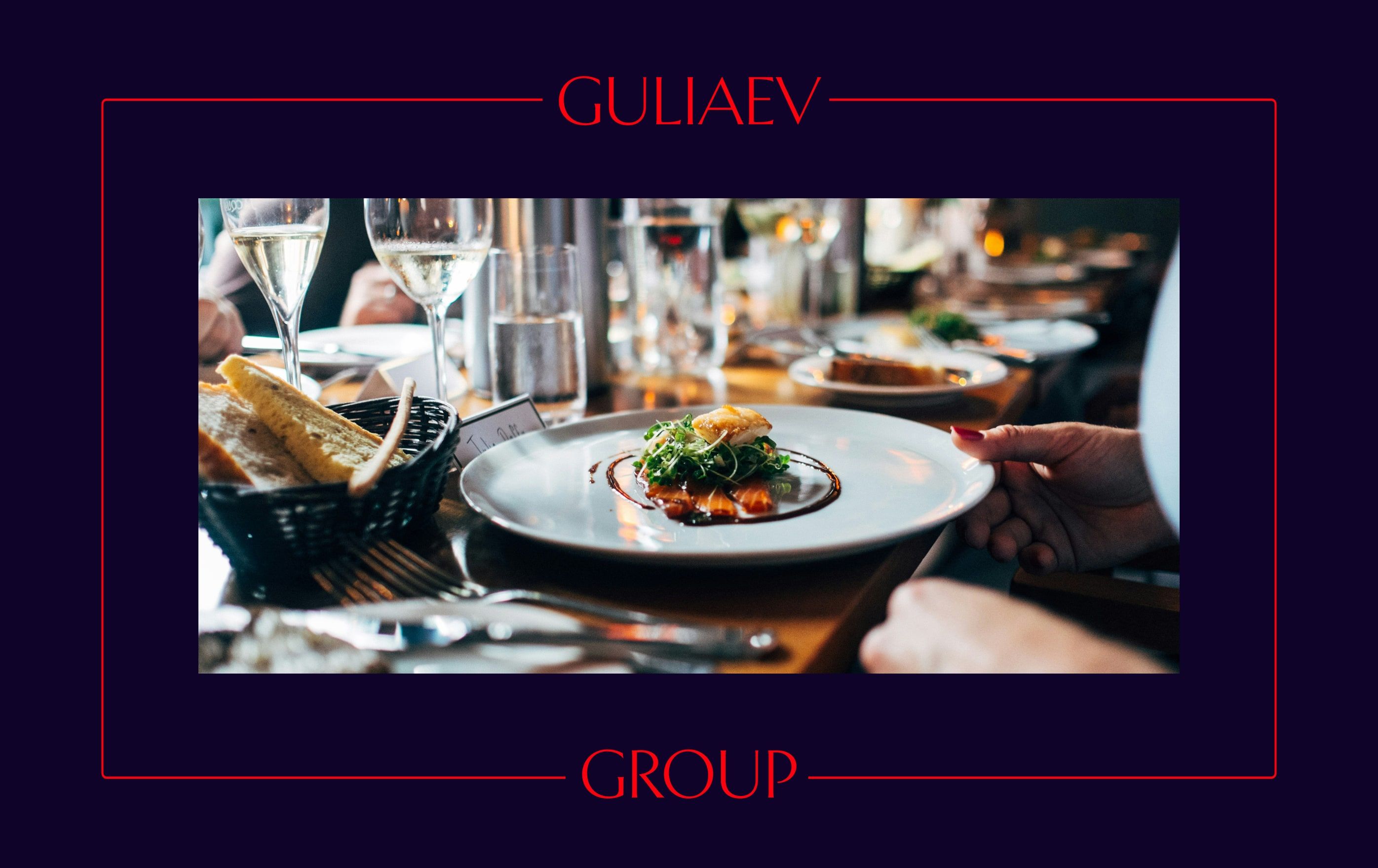 restaurant table framed by the guliaev group lockup