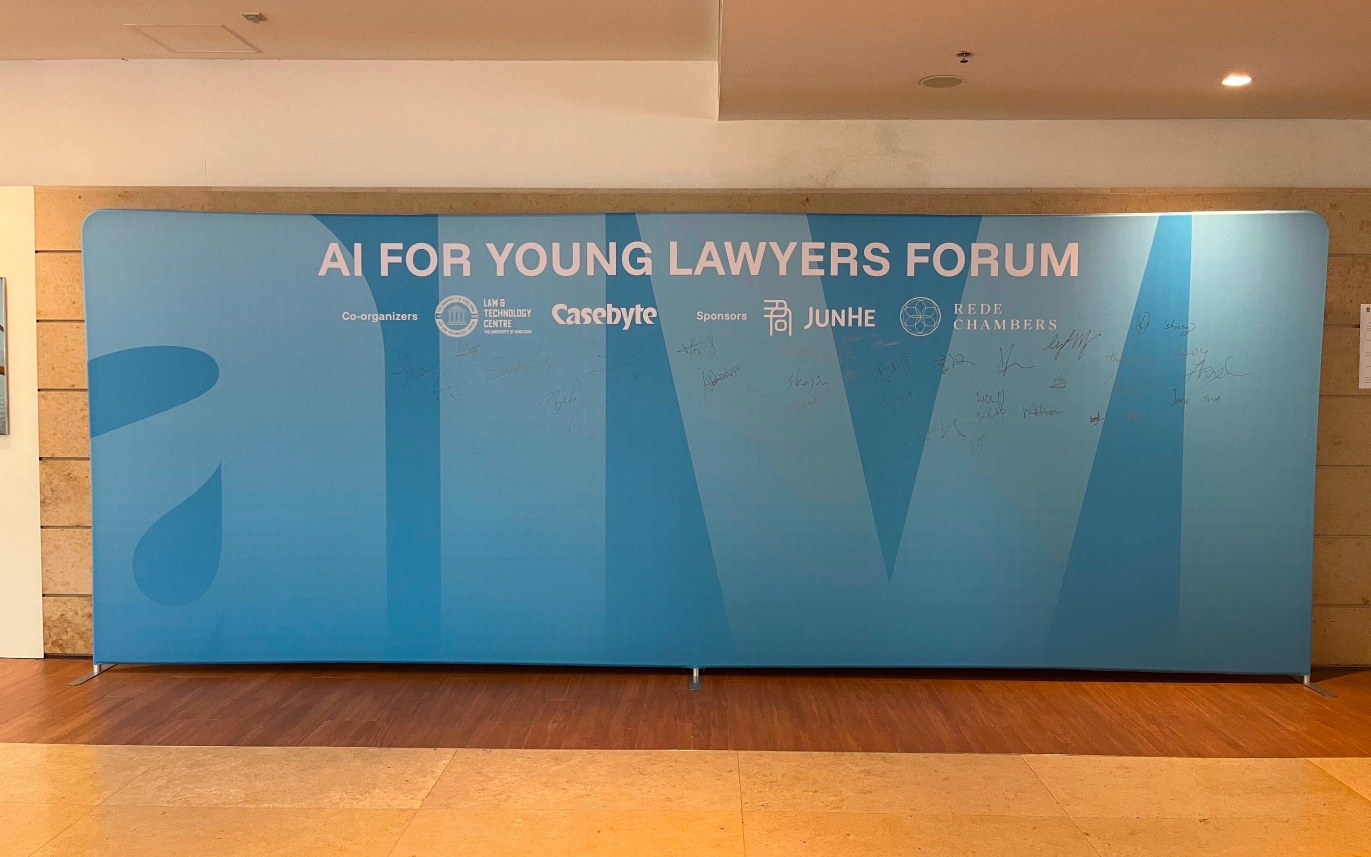 signed aiyl forum backdrop at the event venue