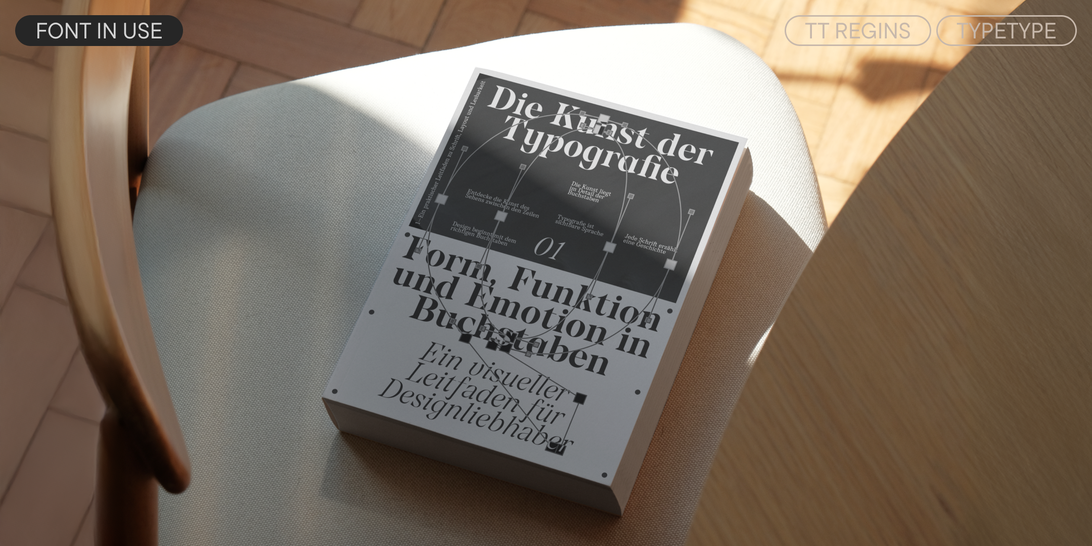a typography book cover set in tt regins on a sunlit chair