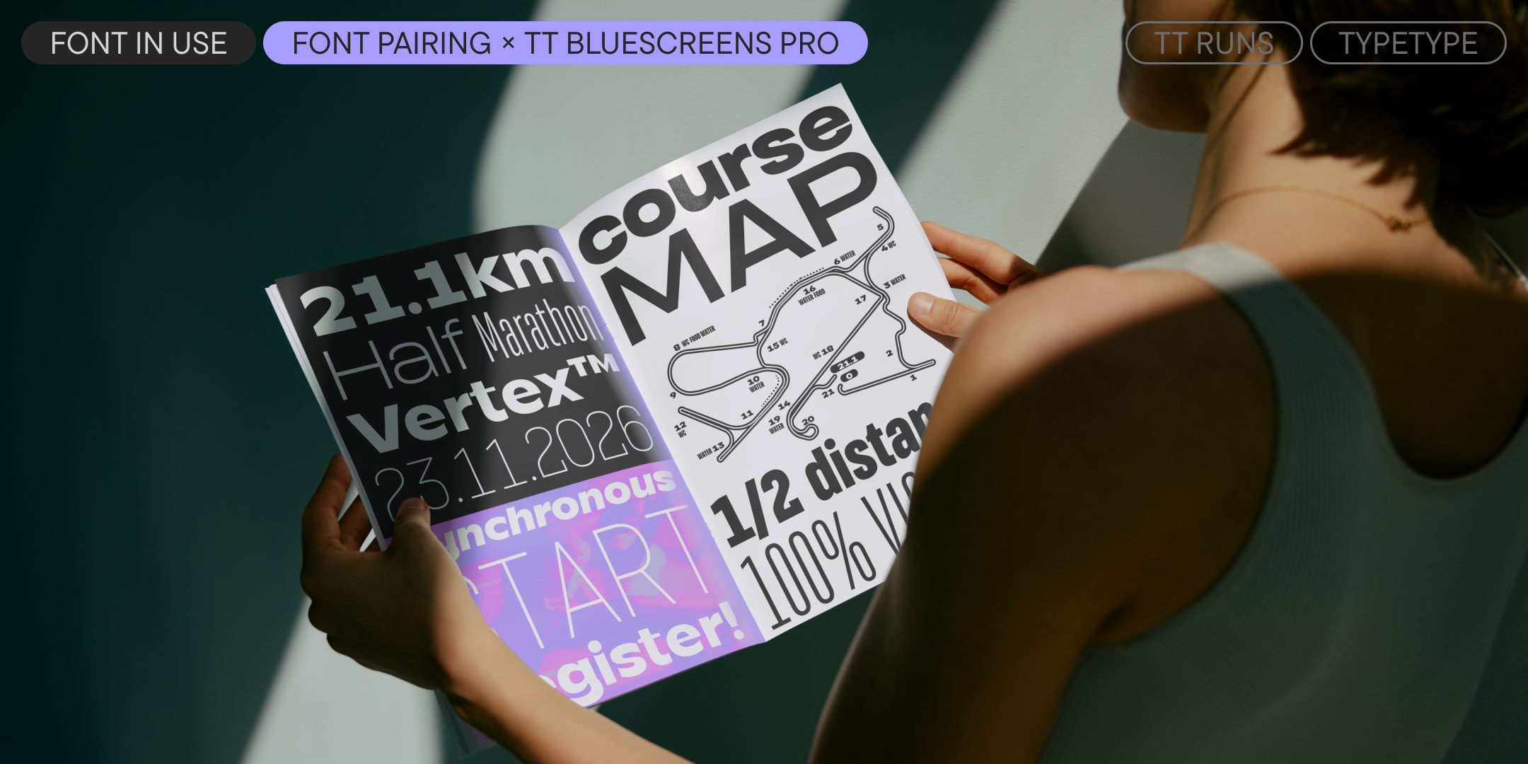 a runner holding a violet and white course map pairing tt runs with tt bluescreens pro